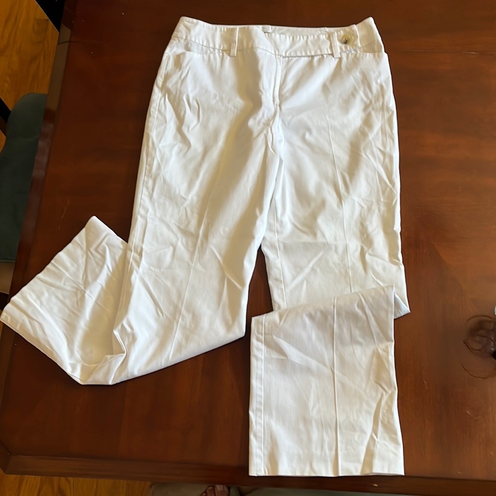 White dress slacks, zip and button enclosure. Nice for work.